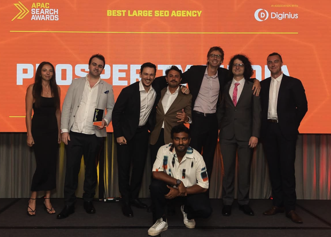 Prosperity Media team on stage after winning Best Large SEO Agency at the APAC Search Awards